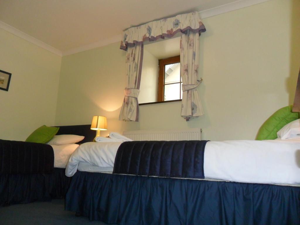 Stag Coach House Hotel Carmel Quarto foto